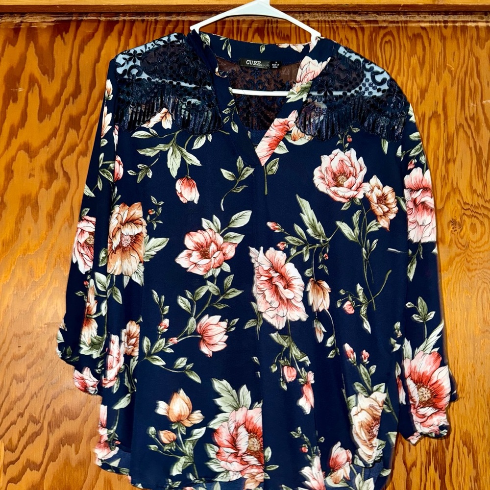 Cure. Floral Blouse with 3/4 Sleeves and Lace Across Shoulders and Back.